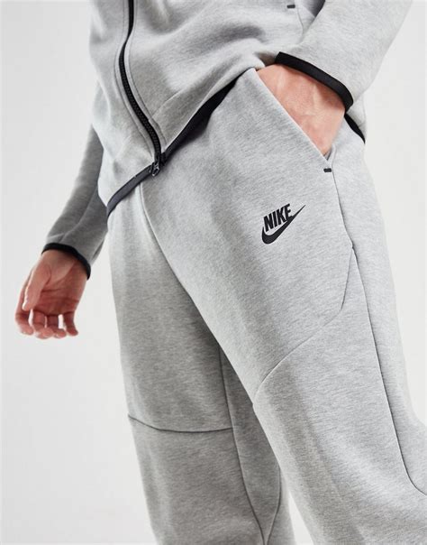 graue nike jogginghose breit herren|Graue Nike Jogginghosen für Sport & Freizeit .